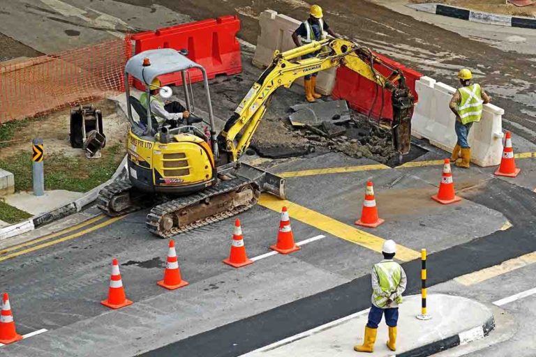Construction crew performing road repair