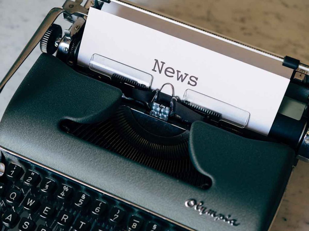 Old Typewriter with NEWS on paper